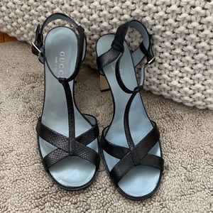 Black Gucci snake skin sandal
